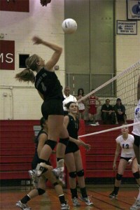 Wildcat Aubrey Larion leaps to the net to return a Seattle Prep volley during Mount Si’s victorious second round Saturday