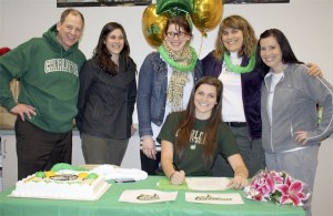 With family and coach Bonnie Foote