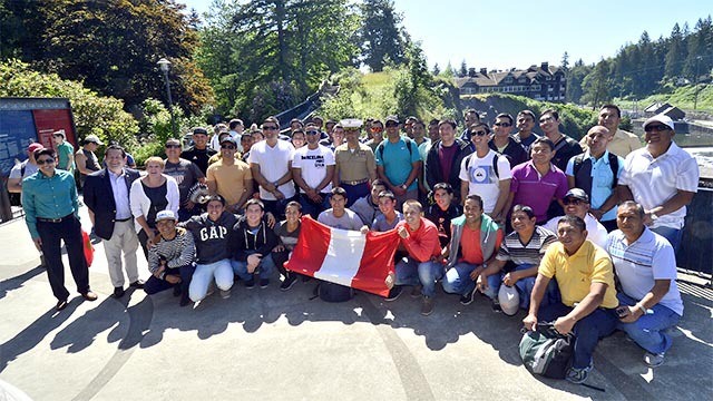 Members of the Peruvian navy and Snoqualmie Sister Cities Association visit Snoqualmie Falls.