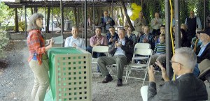 Wendy Thomas of Carmichael’s Hardware gets a little help from the audience as she sings “On the Boardwalk” in celebration of Snoqualmie’s nearly complete phase of work on the Historic Downtown infrastructure project