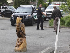 Two sheriff's deputies work the scene of a traffic stop in downtown Snoqualmie last Wednesday