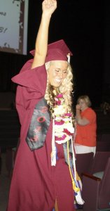 Cedarcrest’s Taylor Kirschenman pumps her fist as she strides out of the auditorium