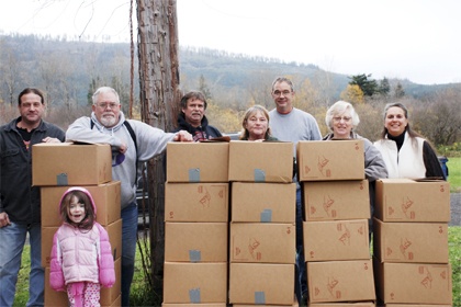 Displaying the boxes of complete Thanksgiving meals (including turkey