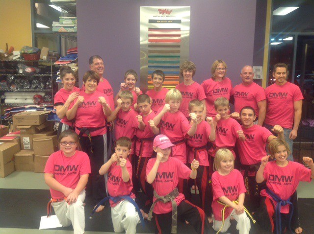 Students at Snoqualmie’s DMW Martial Arts show their physique during the week of Kickathon