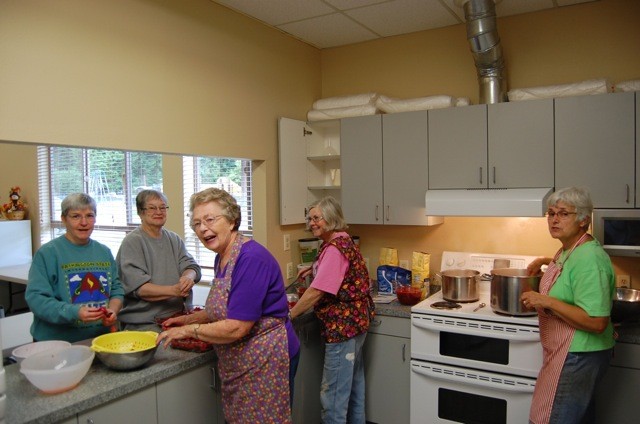 Volunteers make jam for the Tolt Congregational Church’s annual pancake breakfast