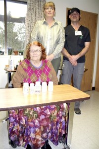 Going over her row of daily medications