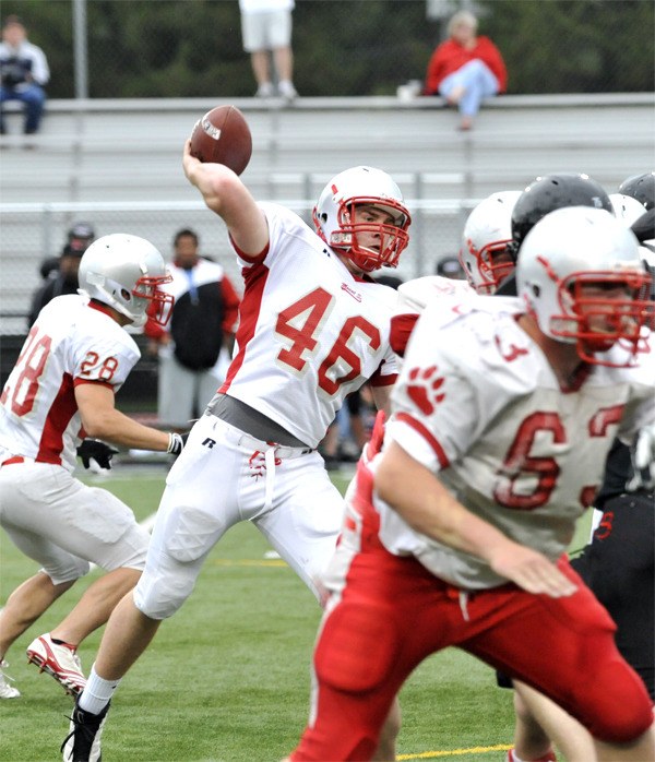 Mount Si senior Ian Ilgenfritz readies a pass during scrimmage play Tuesday