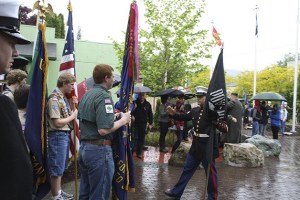 Boy Scouts get some last-minute instructions in carrying the colors during the Memorial Day procession Monday