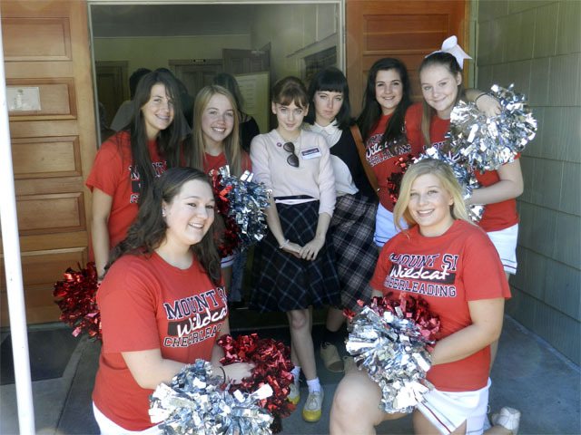 Cheerleaders mingle with costumed fans during Valley's Twin Peaks Fest