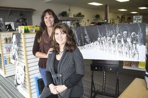 Outgoing Cascade Office Supply owner Stephanie Huber  stands behind new owner and entrepreneur Donna Hayes