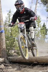 Mountain biker Chris Bentley clears an obstacle at the USA Cycling National Championship