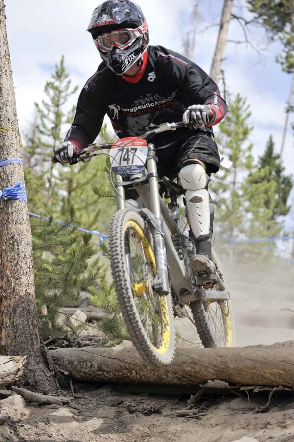 Mountain biker Chris Bentley clears an obstacle at the USA Cycling National Championship