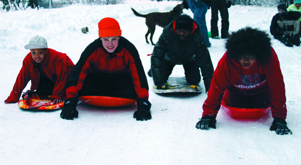 Photos | Family sledding time at Wilderness Rim