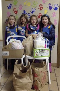 Daisy Troop 44293 from Snoqualmie Valley recently earned their Rose petal by “making the world a better place.” From left