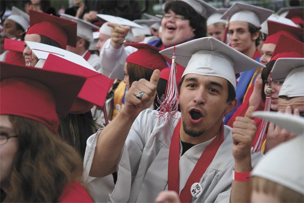Lee Amador cheers on fellow graduates at Mount Si commencement exercises.