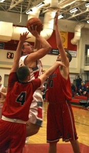 Senior Beau Shain leaps for a bucket attempt Saturday