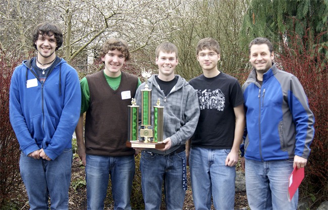 Knowledge Bowl regional champs from left are students Alex Rataezyk