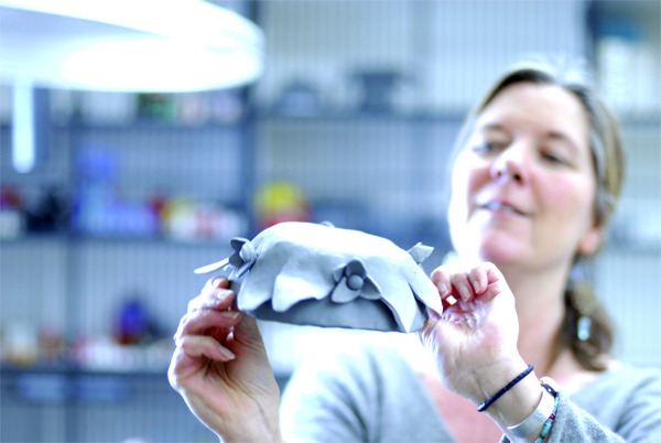 Admiring a clay bowl made for the first-ever Mount Si Food Bank benefit night