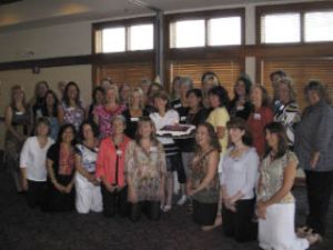 Snoqualmie Valley Women in Business celebrate their one year anniversary with a birthday cake and a rousing birthday party