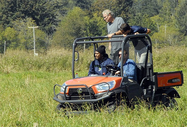 Seahawks running back Marshawn Lynch circles the Beast Mode Challenge race course in a utility vehicle. The challenge race was held Saturday