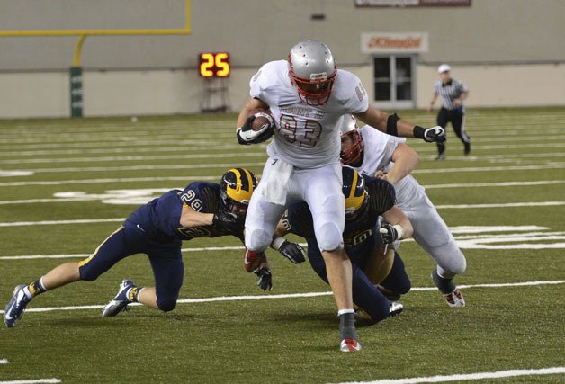 Griffin McLain pushes the ball during a second-half attempt at state. Blake Herman