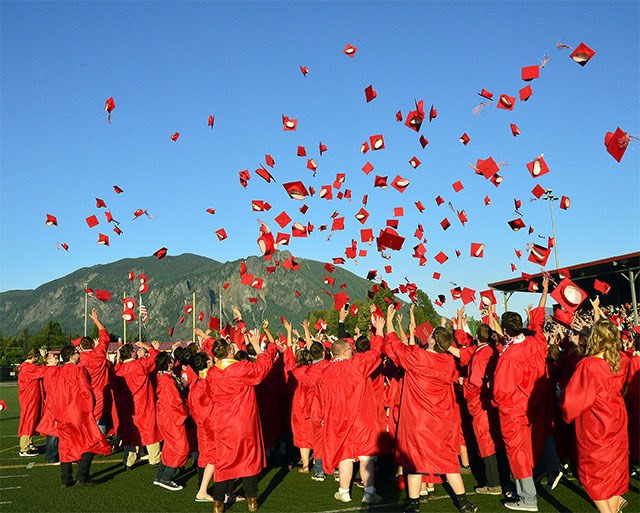 Friday's graduation ceremony at Mount Si High School ended with the traditional tossing of the caps.