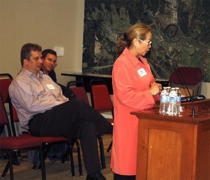 Hospital commission applicant Emma Heron states her case for wanting to join the board—helping the Valley’s disadvanted residents. Behind her is applicant Richard Merikle