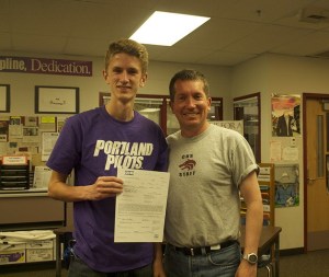 Logan Orndorf with coach Bruce McDowell