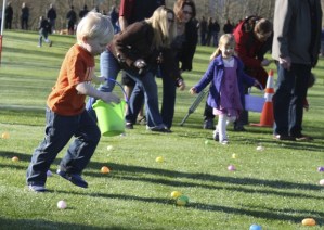 Children race for eggs in the Moose Lodge egg hunt