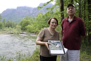 Holding a binder of memories and written appeals