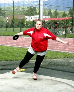 Mount Si thrower Molly Meyers winds up for a throw in the discus at home Thursday