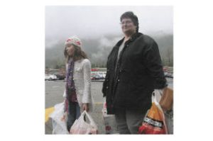 Hauling newly purchased Christmas gifts at the Factory Stores at North Bend