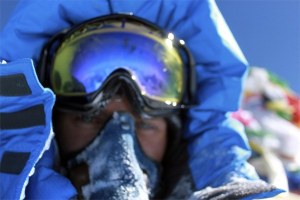 Brian Dickinson raises his goggles in a self-snapped portrait