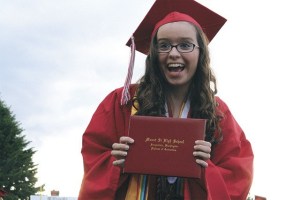 Valedictorian Maria Kajercline shows off her new diploma. Below: An Army Color Guard accompanies the announcement of 15 seniors entering the miltary.