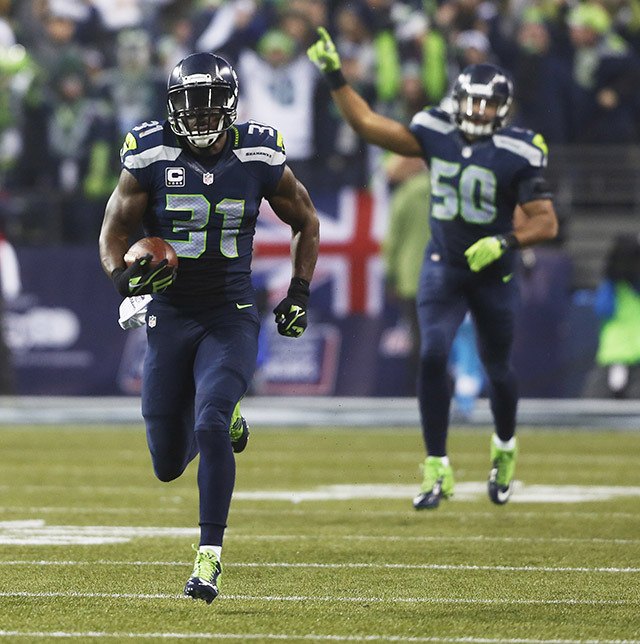 Kam Chancellor runs the ball in the Jan. 10 Seahawks win over Carolina.