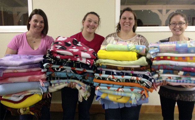 Women and their handiwork at Project Linus events at Sallal Grange: From left are Misty Tucci