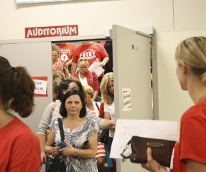 Teachers file out of the Mount Si High auditorium Tuesday evening