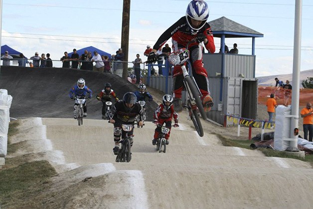 Dakota McFall takes a jump in BMX competition. The North Bend team welcomes anyone interested in BMX to come by the North Bend BMX track