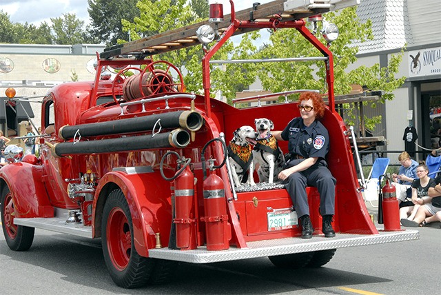 Snoqualmie Fire Department volunteer EMT Cat Cotton and her rescued Dalmatians
