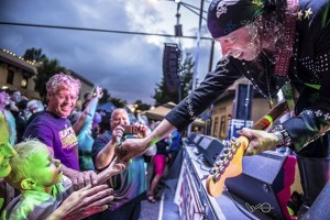 Randy Hanson of Heart by Heart hands a little fan a guitar pick during last year's Block Party concert. Heart by Heart returns to headline the show on Saturday