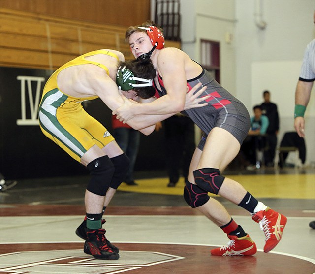In the Jan. 10 Grandview tournament Mount Si wrestler Justin Edens squares off against his opponent.