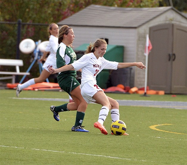 Mount Si freshman forward Miranda Fischer sets up her goal shot