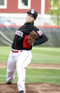 Mount Si thrower Reece Karalus winds up for a pitch during play Tuesday
