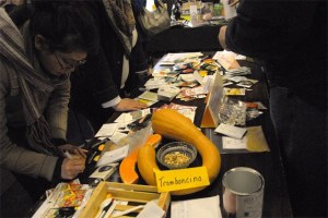 Visitors explore the offerings at the 2013 seed exchange. Transition brings the event back this weekend.
