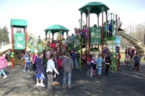 Ribbon Cutting: Officially cutting the ribbon on the new playground at Fall City Elementary School are