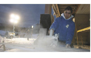 Working on a new home as dusk nears Wednesday