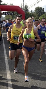 Railroad Days men’s 5K winner Jesse Stevick and 10K women’s winner Claudia Copeland start their races.