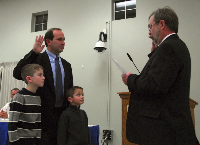 Oath of office, family style, for North Bend's Jonathan Rosen