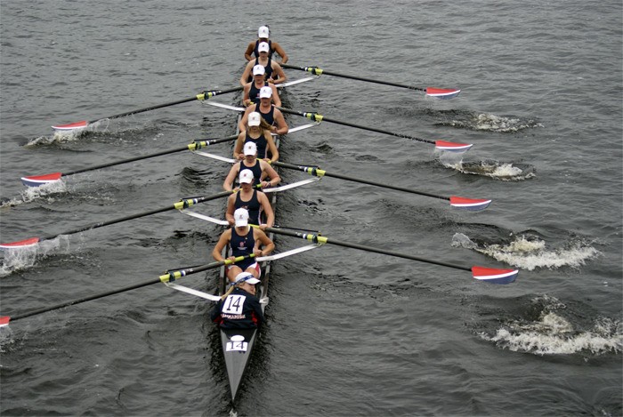 Sammamish Rowing Association’s Women Youth Eight rows on Boston’s Charles River during the Head of the Charles regatta