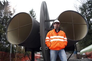 A vast pipe splits behind Dave Jennesse